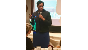 Carla Fleming Speaking at Event. Photo Credit: Carla Fleming